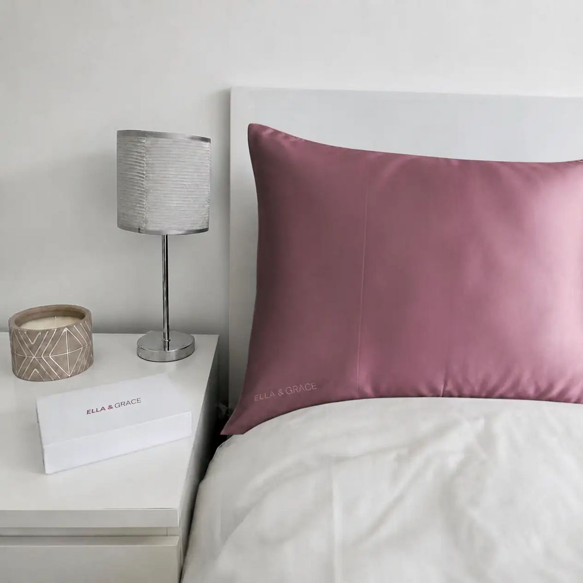 Ella & Grace Soft Blush Pink Silk Pillowcase on Bed in a Bedroom Setting