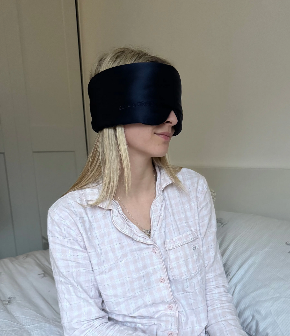 Woman wearing Twilight Navy Blue Silk Sleep Mask
